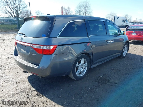 2013 Honda Odyssey Touring with VIN 5FNRL5H97DB018839, listed as a IAAI auction lot 41884016 with 171,650 mi miles. Bid and sale history available at carsss.com. Image 4.