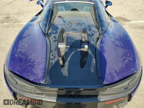 2018 McLaren 570S z VIN SBM13FAA8JW005006, wystawiony jako Copart lot #59641834 z przebiegiem 38 683 mil mil oraz Szkody całkowita. Historia ofert i sprzedaży dostępna na DreamBid. Obrazek 10.