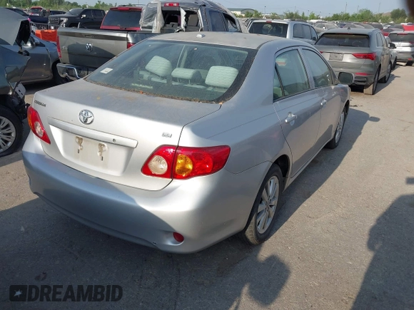 2009 Toyota Corolla with VIN 1NXBU40E59Z078727, listed as a IAAI auction lot 42035739 with 113,814 mi miles. Bid and sale history available at carsss.com. Image 4.