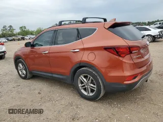 2017 Hyundai Santa Fe 2.4L z VIN 5XYZUDLB6HG411375, wystawiony jako Copart lot #50551165 z przebiegiem 35 597 mil mil oraz Czysty tytuł • Clean title. Historia ofert i sprzedaży dostępna na DreamBid. Obrazek 2.