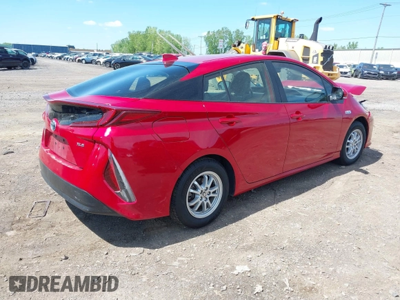 2021 Toyota Prius LE with VIN JTDKAMFP6M3192515, listed as a IAAI auction lot 42302003 with 74,247 mi miles and . Bid and sale history available at DreamBid. Image 4.