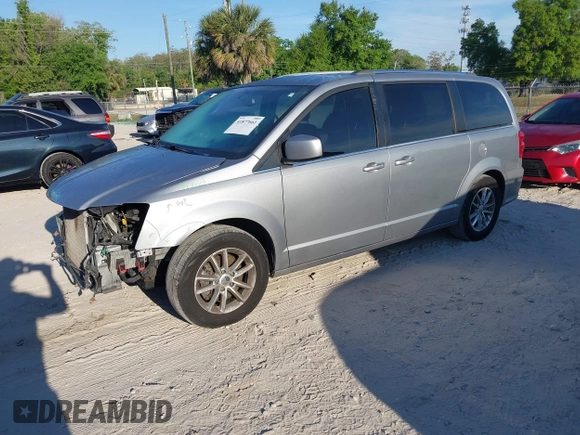 2018 Dodge Grand Caravan SXT with VIN 2C4RDGCG5JR267428, listed as a IAAI auction lot 41877661 with 103,633 mi miles and . Bid and sale history available at DreamBid. Image 22.