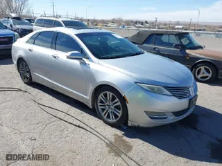 2014 Lincoln MKZ with VIN 3LN6L2GK2ER817686, listed as a IAAI auction lot 41505907 with 318,636 mi miles. Bid and sale history available at carsss.com. Image 1.