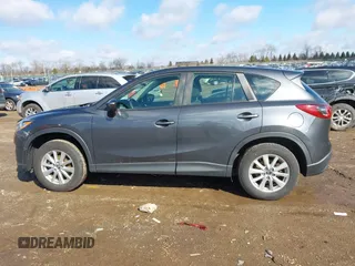 2016 Mazda CX-5 Sport with VIN JM3KE4BY5G0829927, listed as a IAAI auction lot 41678552 with 121,476 mi miles. Bid and sale history available at carsss.com. Image 14.