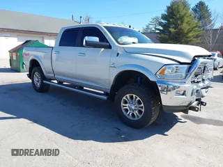 2018 Ram 2500 Laramie z VIN 3C6UR5FL4JG404249, wystawiony jako IAAI lot #41965199 z przebiegiem 123 506 mil mil oraz . Historia ofert i sprzedaży dostępna na DreamBid. Obrazek 1.