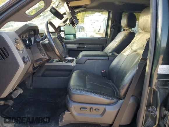 2012 Ford F-350 XL with VIN 1FT8W3B67CEC66479, listed as a Copart auction lot 74112284 with 64,711 mi miles and Salvage title. Bid and sale history available at DreamBid. Image 7.