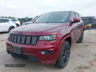 2018 Jeep Grand Cherokee Altitude with VIN 1C4RJEAGXJC281236, listed as a IAAI auction lot 42378899 with 102,276 mi miles and . Bid and sale history available at DreamBid. Image 17.