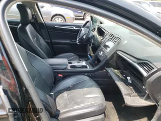 2017 Ford Fusion Titanium с VIN 3FA6P0K93HR170257, выставлен на аукционе Copart как лот 50977791 с пробегом 96 692 миль миль и Списание • Salvage title. История ставок и продаж доступна на DreamBid. Изображение 5.