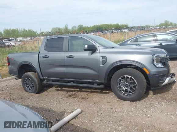 2024 Ford Ranger XLT z VIN 1FTER4HH6RLE34724, wystawiony jako IAAI lot #42256858 z przebiegiem 12 438 mil mil oraz . Historia ofert i sprzedaży dostępna na DreamBid. Obrazek 14.
