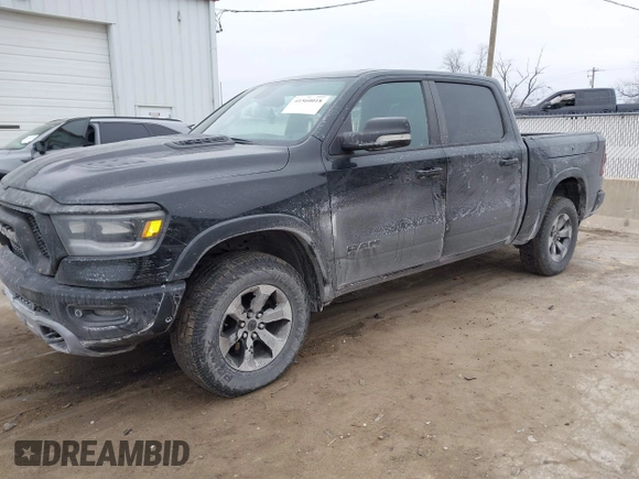 2019 Ram 1500 Rebel z VIN 1C6SRFLT6KN599362, wystawiony jako IAAI lot #41560018 z przebiegiem Nie podano mil oraz . Historia ofert i sprzedaży dostępna na DreamBid. Obrazek 17.