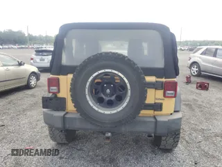 2013 Jeep Wrangler Sport with VIN 1C4AJWAG1DL672816, listed as a IAAI auction lot 42597238 with 105,910 mi miles and . Bid and sale history available at DreamBid. Image 16.