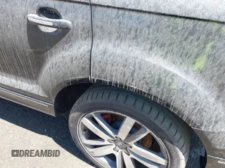 2014 Audi Q7 Premium Plus with VIN WA1LGAFEXED014547, listed as a IAAI auction lot 42256396 with 158,038 mi miles and . Bid and sale history available at DreamBid. Image 6.