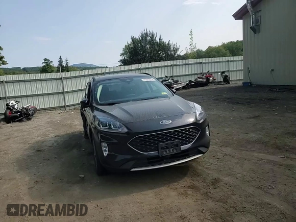 2021 Ford Escape SEL Hybrid z VIN 1FMCU9CZ7MUA94260, wystawiony jako Copart lot #71013514 z przebiegiem Nie podano mil oraz Szkoda całkowita • Salvage title. Historia ofert i sprzedaży dostępna na DreamBid. Obrazek 12.