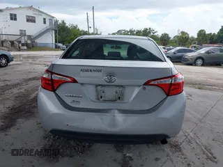 2015 Toyota Corolla L with VIN 2T1BURHE5FC461887, listed as a IAAI auction lot 42560992 with 176,660 mi miles and . Bid and sale history available at DreamBid. Image 16.