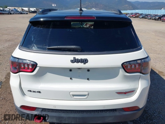 2021 Jeep Compass Trailhawk with VIN 3C4NJDDB0MT551172, listed as a IAAI auction lot 40155947 with 50,794 mi miles and . Bid and sale history available at DreamBid. Image 16.