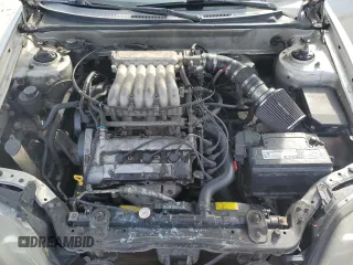 2003 Hyundai Tiburon GT z VIN KMHHN65F13U102985, wystawiony jako Copart lot #45294325 z przebiegiem 326 919 mil mil oraz Szkoda całkowita • Salvage title. Historia ofert i sprzedaży dostępna na DreamBid. Obrazek 11.