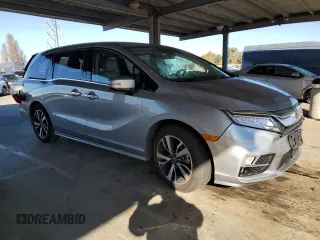 2020 Honda Odyssey Elite with VIN 5FNRL6H92LB059920, listed as a Copart auction lot 49993995 with 40,737 mi miles and Salvage Title. Bid and sale history available at DreamBid. Image 4.