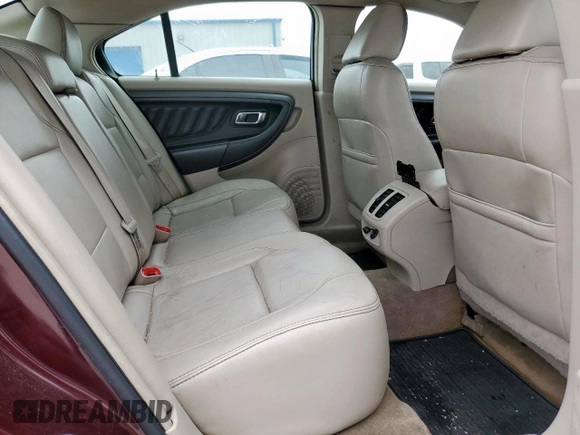 2011 Ford Taurus SEL z VIN 1FAHP2EW6BG183640, wystawiony jako Copart lot #54662745 z przebiegiem 149 309 mil mil oraz Szkoda całkowita • Salvage title. Historia ofert i sprzedaży dostępna na DreamBid. Obrazek 10.