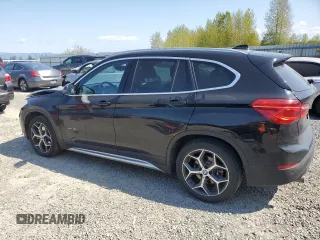 2017 BMW X1 xDrive28i with VIN WBXHT3C32H5F82141, listed as a Copart auction lot 53311785 with 52,867 mi miles and Salvage Title. Bid and sale history available at carsss.com. Image 2.
