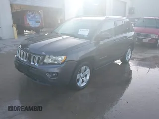 2015 Jeep Compass Latitude with VIN 1C4NJCEB7FD192016, listed as a IAAI auction lot 41836268 with 149,128 mi miles. Bid and sale history available at carsss.com. Image 2.