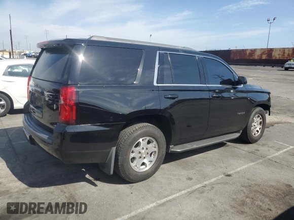 2018 Chevrolet Tahoe LS with VIN 1GNSCAKC9JR201994, listed as a Copart auction lot 53100735 with 182,460 mi miles and Salvage title. Bid and sale history available at DreamBid. Image 3.