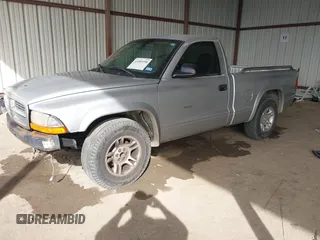 2002 Dodge Dakota z VIN 1B7FL36X42S532446, wystawiony jako IAAI lot #41683398 z przebiegiem 245 626 mil mil oraz . Historia ofert i sprzedaży dostępna na DreamBid. Obrazek 2.