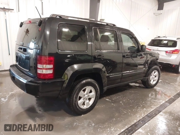 2009 Jeep Liberty Sport with VIN 1J8GN28K29W537201, listed as a IAAI auction lot 41740471 with 151,082 mi miles. Bid and sale history available at carsss.com. Image 4.