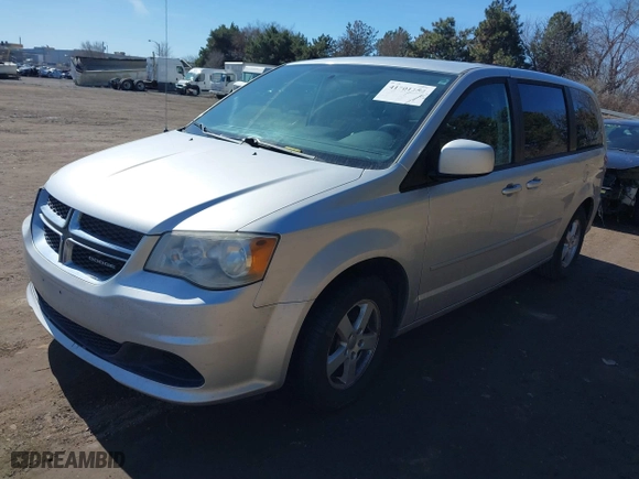 2011 Dodge Grand Caravan Mainstreet with VIN 2D4RN3DG0BR790008, listed as a IAAI auction lot 41701154 with 117,971 mi miles. Bid and sale history available at carsss.com. Image 2.