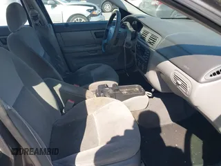 2005 Ford Taurus SE with VIN 1FAFP53U95A289971, listed as a IAAI auction lot 42143134 with 167,702 mi miles. Bid and sale history available at carsss.com. Image 5.