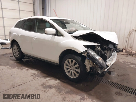 2012 Mazda CX-7 i Touring z VIN JM3ER2C51C0411837, wystawiony jako IAAI lot #42023100 z przebiegiem 85 112 mil mil oraz . Historia ofert i sprzedaży dostępna na DreamBid. Obrazek 1.