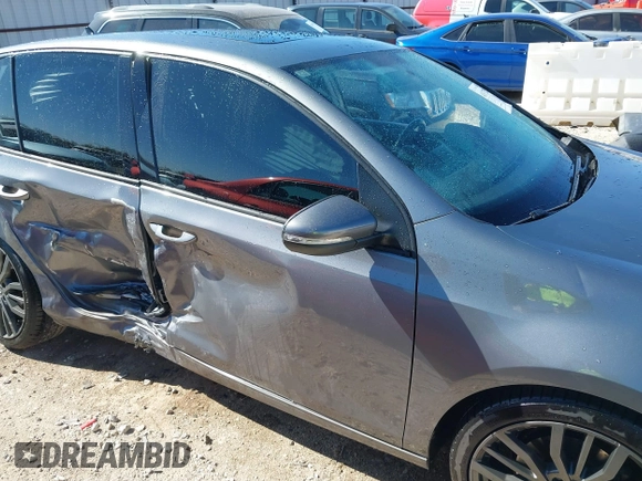 2012 Volkswagen Golf TDI z VIN WVWDM7AJ9CW240204, wystawiony jako IAAI lot #41837287 z przebiegiem 172 512 mil mil oraz . Historia ofert i sprzedaży dostępna na DreamBid. Obrazek 13.