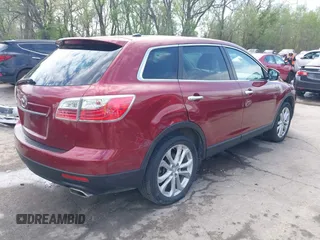 2011 Mazda CX-9 Grand Touring z VIN JM3TB2DA6B0310296, wystawiony jako IAAI lot #42022744 z przebiegiem 163 889 mil mil oraz . Historia ofert i sprzedaży dostępna na DreamBid. Obrazek 4.