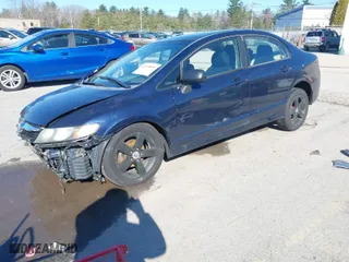2006 Honda Civic Sdn EX with VIN 1HGFA16816L058198, listed as a IAAI auction lot 41998899 with 147,529 mi miles. Bid and sale history available at carsss.com. Image 2.