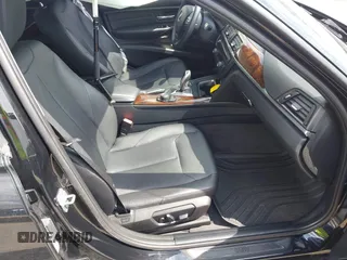 2014 BMW 3 Series 320i xDrive with VIN WBA3C3C51EP662162, listed as a IAAI auction lot 42019994 with 78,066 mi miles. Bid and sale history available at carsss.com. Image 5.