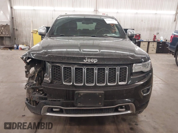 2014 Jeep Grand Cherokee Overland with VIN 1C4RJFCG8EC177899, listed as a IAAI auction lot 41695290 with 200,867 mi miles and . Bid and sale history available at DreamBid. Image 13.
