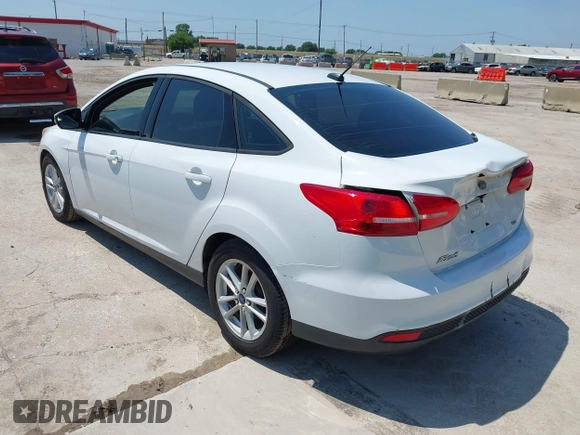 2017 Ford Focus SE with VIN 1FADP3F28HL307889, listed as a IAAI auction lot 42414711 with 169,579 mi miles and . Bid and sale history available at DreamBid. Image 3.