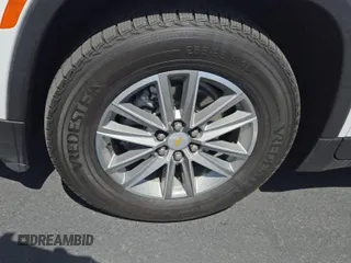 2022 Chevrolet Traverse LT with VIN 1GNERHKW7NJ177665, listed as a IAAI auction lot 42667314 with 103,830 mi miles and . Bid and sale history available at DreamBid. Image 9.