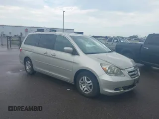 2005 Honda Odyssey EX-L with VIN 5FNRL38635B028747, listed as a IAAI auction lot 42805480 with 148,557 mi miles and . Bid and sale history available at DreamBid. Image 1.