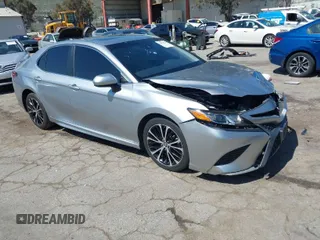 2019 Toyota Camry LE z VIN 4T1B11HK2KU710252, wystawiony jako IAAI lot #41851759 z przebiegiem 108 310 mil mil oraz . Historia ofert i sprzedaży dostępna na DreamBid. Obrazek 1.