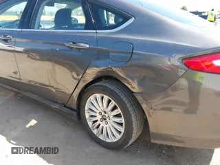 2016 Ford Fusion SE Hybrid with VIN 3FA6P0LU9GR405097, listed as a IAAI auction lot 42000535 with 58,293 mi miles. Bid and sale history available at carsss.com. Image 6.