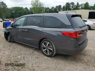 2023 Honda Odyssey Touring with VIN 5FNRL6H86PB024066, listed as a Copart auction lot 58414575 with 29,827 mi miles and Salvage title. Bid and sale history available at DreamBid. Image 2.