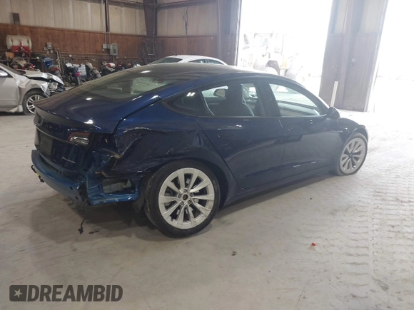 2022 Tesla Model 3 Long Range with VIN 5YJ3E1EB8NF255163, listed as a IAAI auction lot 42105451 with 40,166 mi miles and . Bid and sale history available at DreamBid. Image 4.