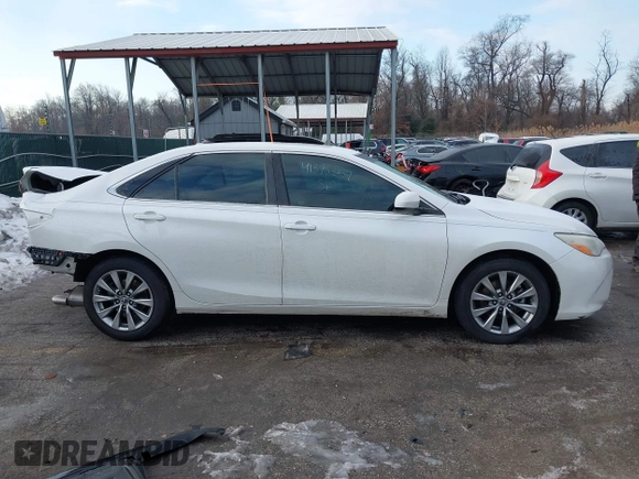 2016 Toyota Camry XSE with VIN 4T1BK1FK2GU570484, listed as a IAAI auction lot 41395359 with 122,852 mi miles. Bid and sale history available at carsss.com. Image 14.