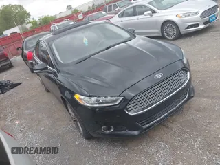 2016 Ford Fusion Titanium with VIN 3FA6P0K97GR118922, listed as a IAAI auction lot 42121212 with 256,584 mi miles and . Bid and sale history available at DreamBid. Image 1.