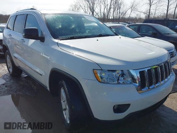 2012 Jeep Grand Cherokee Laredo with VIN 1C4RJFAG6CC279427, listed as a IAAI auction lot 41956034 with 86,689 mi miles. Bid and sale history available at carsss.com. Image 1.