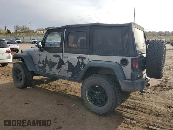 2015 Jeep Wrangler Unlimited Willys Wheeler with VIN 1C4BJWDG7FL690952, listed as a Copart auction lot 51493715 with 45,497 mi miles and Salvage Title. Bid and sale history available at DreamBid. Image 2.