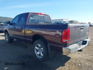 2005 Dodge 1500 SLT with VIN 1D7HU18D75S108492, listed as a IAAI auction lot 42030624 with 213,834 mi miles. Bid and sale history available at carsss.com. Image 3.