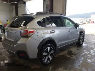 2014 Subaru Crosstrek Touring with VIN JF2GPBKC0EH312164, listed as a IAAI auction lot 42348820 with 214,494 mi miles and . Bid and sale history available at DreamBid. Image 4.