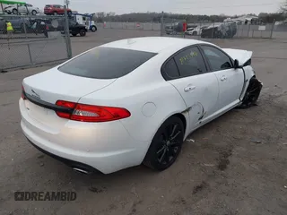 2014 Jaguar XF SC with VIN SAJWA0EX0E8U09381, listed as a IAAI auction lot 41783386 with 27,730 mi miles and . Bid and sale history available at DreamBid. Image 4.