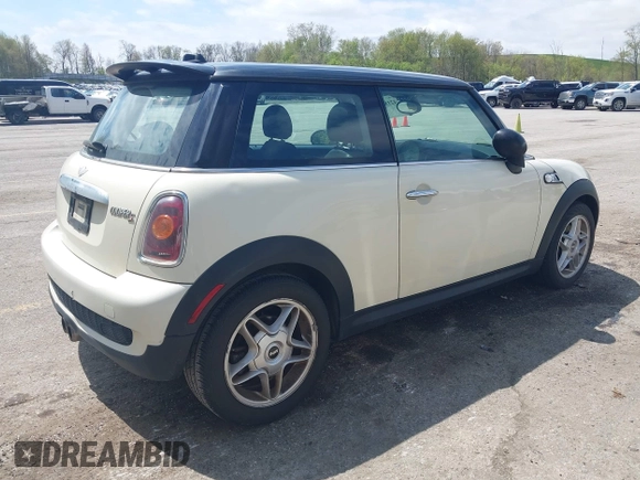 2007 MINI Hardtop S with VIN WMWMF73567TT84033, listed as a IAAI auction lot 42189573 with 75,177 mi miles and . Bid and sale history available at DreamBid. Image 4.